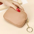 Beige genuine leather mini coin purse with lychee grain, gold zipper and keychain ring - Nude