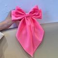 Neon pink bow hair clip with long streamers in bright fluorescent polyester fabric - Spring Clips / Pink