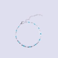 Detail of silver stainless steel lip chain with sky blue enamel charms and lobster clasp - Steel + Lake Blue