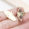 Ciondolo a farfalla in lega dorata con smalto marrone per la creazione di gioielli - Farfalla Marrone 28x15mm