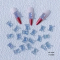 Macro shot of 8x10mm ice blue resin bear nail charms and manicure design on white background - YD-322# Blue Aurora