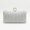 Elegant silver pleated clutch bag featuring a gold rhinestone ring buckle for formal events - Silver