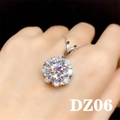 Macro view of sunflower shaped moissanite pendant necklace on hand with brilliant fire - Style DZ06 [2 Carat, No Chain]