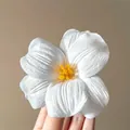 Delicate white fabric flower hair clip featuring realistic petals and yellow stamen - White Tulip