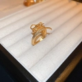 Macro view of gold-plated dragon ring showing intricate scale textures and dragon head - Dragon Shaped Gold Ring (14#)