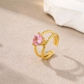Vergulde roestvrijstalen ring met een roze hart-zirkonia en gedraaid touwontwerp - Hartsteen/Dubbel Gedraaid / Goud-Roze Zirkonia (Hart)