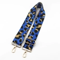 Close-up of leopard print polyester bag strap with premium gold metal hardware - Blue Gold Buckle