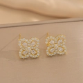 Exquisite gold clover stud earrings with full micro-pave cubic zirconia crystals - Gold Stud Earrings (557)