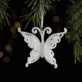 Glittery white butterfly hanging ornament for Christmas decor on green pine branches - Butterfly Style