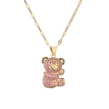 Collana dorata con ciondolo a forma di orsetto e cristalli rosa e neri su sfondo bianco - Rosa Rossa
