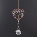 Detail of copper wire-wrapped heart life tree with crystals and a clear prism ball - Amethyst Heart Style