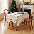 Beige Christmas lace tablecloth with festive embroidery on a wooden dining table - Christmas Stocking Embroidery