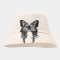Vue détaillée de l'imprimé papillon sur ce chapeau bob en toile de coton crème - Beige