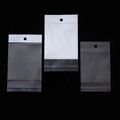 Three sizes of clear self-adhesive bags with white headers and hanging holes for display - 200Pcs Hair Clip Packaging Bags Set