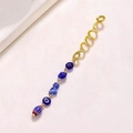 Detail of golden spiral hair ring with blue evil eye beads and natural stone pendants - Spiral Pendant / Blue Sapphire Long