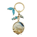 Goldener Ozean Schlüsselanhänger mit weißem Muschel-Anhänger, Fischschwanz und Seepferdchen - Blau Seepferdchen Muschel