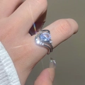 Detail of silver streamlined ring with light purple oval stone and small diamonds - Silver Streamline Blue Gem Ring (G-401)
