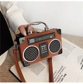 Brown vintage radio shaped handbag with metal handle and shoulder strap in PU leather - Tan
