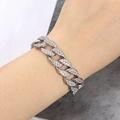 Silver Cuban link bracelet with clear crystals worn on a model's wrist for hip hop style - 7inch (18cm) Bracelet / Silver