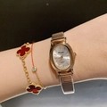 Elegant rose gold oval quartz watch for women with a stainless steel mesh strap - Metal Elastic Strap / Rose Gold/White Dial