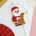 Weihnachtsmann-Kuchendeko aus weichem Harz 4x5,5cm für festliche Party-Dekorationen - #6013 Weihnachtsmann mit Weihnachtskarte