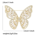 Spilla a farfalla dorata con micro-pave di zirconi, misura 3,3x2,9cm, 6,2g - Oro Bianco