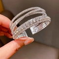 Luxurious silver multilayer cuff bracelet with pavé diamonds and crystals on a hand - 2# Bracelet-Silver