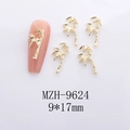 Detailed view of golden bamboo alloy nail art charms with dimensions 9x17mm on white - Bamboo Gold Color Style (9624)