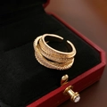 Goldener mehrlagiger offener Ring mit runden Diamanten und Zirkonia im Baguetteschliff - Goldener Überkreuzter Offener Ring