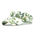 Detail of white sun visor with green leaves and red berries botanical pattern print - Green Berry Leaves