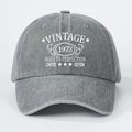 Detail of Vintage 1973 print on grey washed denim baseball cap with retro lettering - One Size / Gray