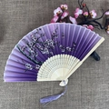 Classic folding fan with purple gradient silk, carved bamboo ribs and silk tassel - No.53 Purple Gradient Hollow Fan