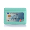 Detail of mint green lychee grain leather card holder with transparent window and neat stitching - Green