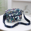 Multi-compartment crossbody bag with colorful abstract geometric print and sport logo - Colorful Thorns