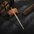 Golden sword hair pin for traditional Hanfu styling on a vintage textured background - Ancient Sword Hairpin / Color Retention KC Gold