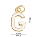 Macro view of gold-plated G-letter charm with white enamel and 10.9mm size details - Letter G
