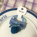 Blue plaid fabric hair scrunchie with lace bow and soft fabric ball on display card - Blue Series