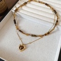 Detail of double-layer tiger eye bead necklace with a heart-shaped golden pendant - 28# Gold Coffee Double Layer Heart Beaded Necklace