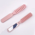 Mini spazzola pieghevole rosa con specchio integrato e design traforato - Rosa