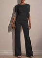 Detailaufnahme eleganter Perlenverzierung am geschlitzten Ärmel des schwarzen Jumpsuits - S / Schwarz