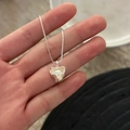 Elegant silver heart necklace featuring a single natural freshwater pearl on thin chain - Irregular Heart Pearl Necklace