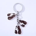 Stylischer Emaille-Haustier-Schlüsselanhänger mit drei braun-weißen Jagdhund-Anhängern - Springer Spaniel (6 Springer)