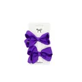 Detail view of two purple ribbed ribbon bow hair clips on a white fashion display card - Purple