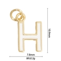 Macro detail of gold letter H pendant with white enamel inlay and size measurements - Letter H