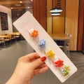 Set of five colorful floral elastic hair ties with textured 3D petals on a display card - Flat Five-Petal Flower Style (22#) / 10 Pieces Pack