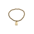 Bracelet à perles dorées avec un charm carré en métal et gravure de la lettre L - Lettre L