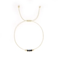 Handgefertigtes Armband mit facettierten schwarzen Perlen und goldenen Kupferperlen - Schwarzer Onyx - Einzelstück