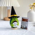 Crochet avocado doll with black witch hat and a card saying You've totally guac this - Avocado + Card + Hat + Base