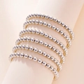 Detailed close-up of a 6-piece multilayer silver metal beaded elastic bracelet set - 6Pcs Silver Set