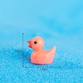 Miniature orange resin duck figurine for decor, dimensions 1.6cm height by 1.8cm length - Orange